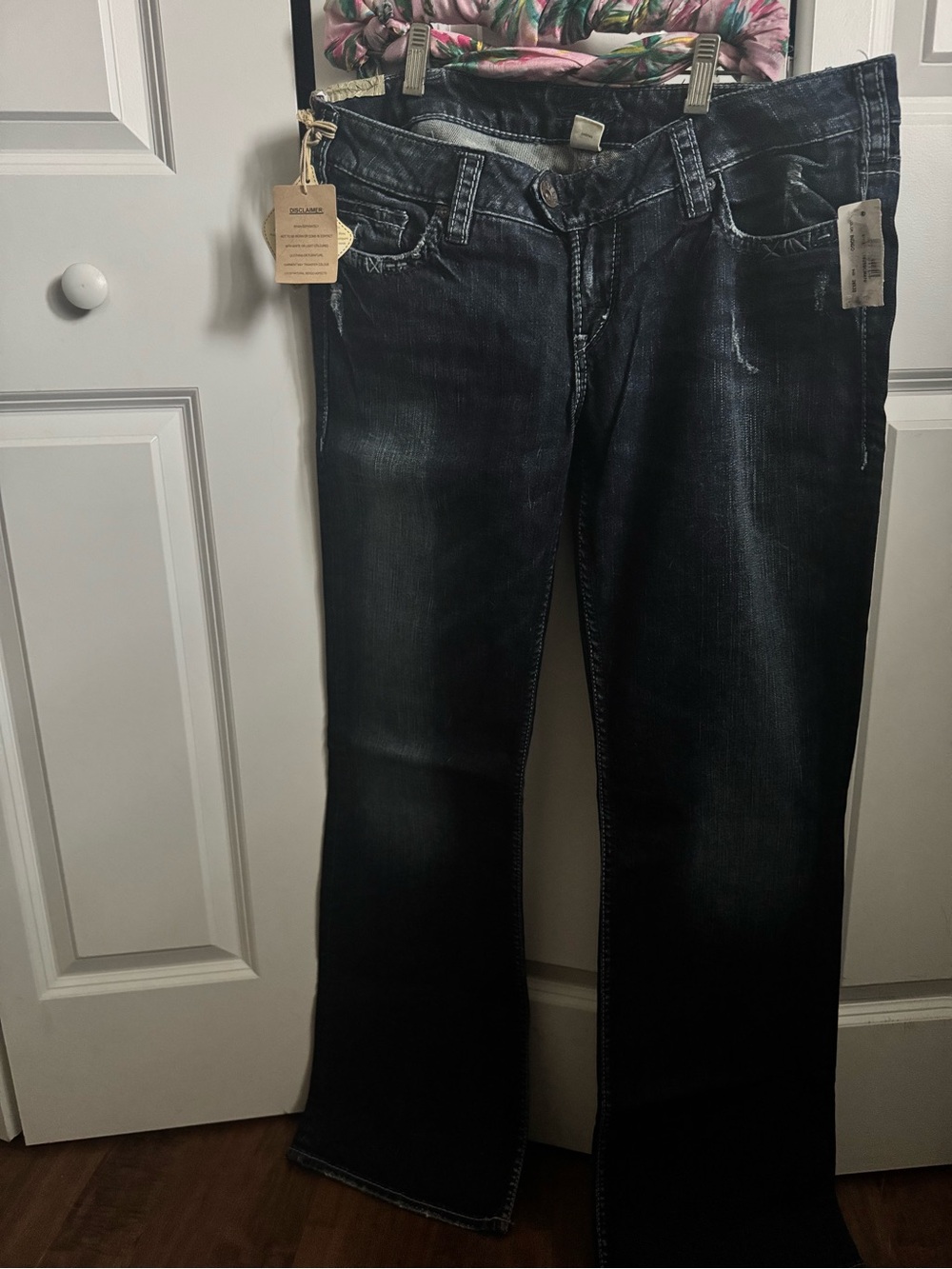 Silver Jeans Indigo Low Rise Flare Jeans with Subtle Fade